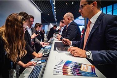 Visitors at an information desk at Chemspec Europe